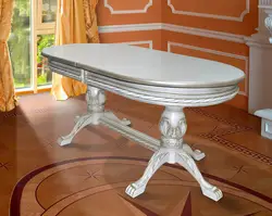 Oval extendable table in the living room photo