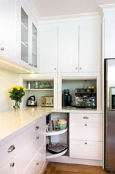 Tall kitchen cabinets interior photo