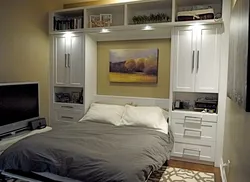 Bedroom wall with bed photo