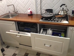 Straight kitchen with dishwasher photo