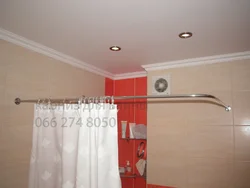 Curtains with curtain rods for bathtub photo