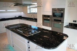 Kitchen With Black Marble Countertop Photo