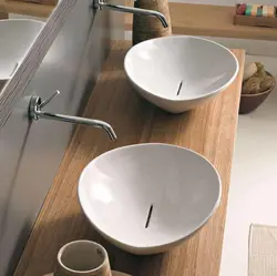 Косаи оид ба countertop дар акс ҳаммом