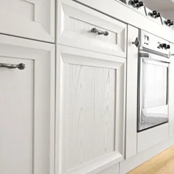White kitchen handles photo