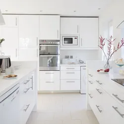 White kitchen handles photo