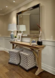Mirror with table in the hallway photo