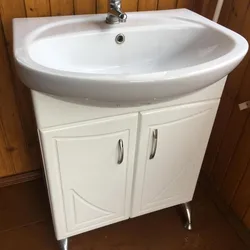 Sink with legs for bathroom photo