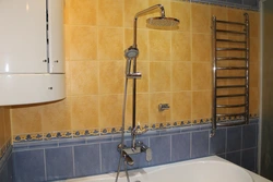 Faucet With Tiles In The Bathroom Photo