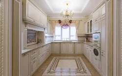 Light tiles in the kitchen interior photo