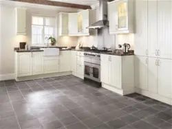 Light tiles in the kitchen interior photo