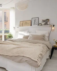 Photo of a bedroom with flowers at the headboard