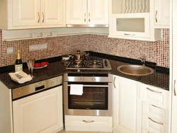 Photo of a kitchen with a small hob