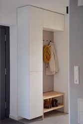 Narrow cabinets in a small hallway photo