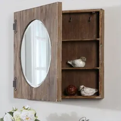 Wooden bathroom mirror photo