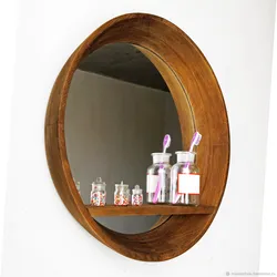 Wooden bathroom mirror photo