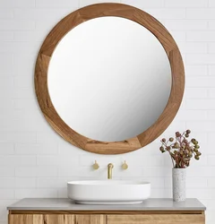 Wooden bathroom mirror photo