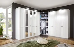 Белые угловые шкафы в гостиной фото