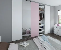 Gray and white wardrobe in the bedroom photo