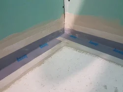 Waterproofing in the bathroom under tiles photo