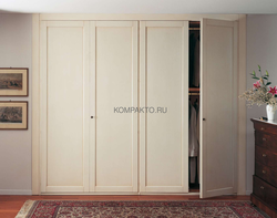White hinged wardrobes in the hallway photo