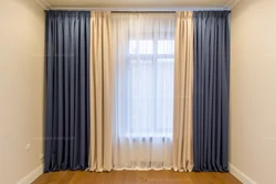 Curtains On The Floor In The Bedroom Photo