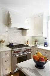 Kitchens with a cabinet above the stove photo