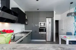 Gray kitchen with black refrigerator photo