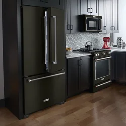 Gray kitchen with black refrigerator photo
