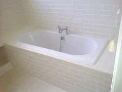 Photo of tile bathtub rim