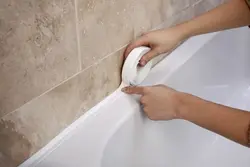 Photo of tile bathtub rim