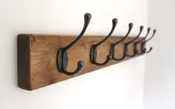 Hooks on the wall in the hallway photo