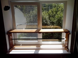 Shelf on the windowsill in the kitchen photo