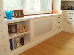 Shelf on the windowsill in the kitchen photo