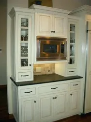Buffet with microwave in the kitchen photo