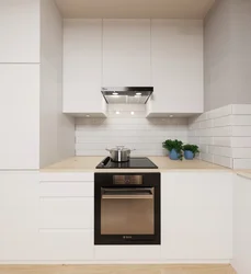 White kitchen with built-in hood photo