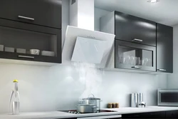 White kitchen with built-in hood photo