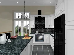 White kitchen on black tiles photo