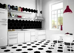 White kitchen on black tiles photo