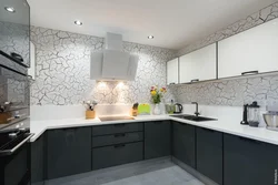 White Kitchen On Black Tiles Photo
