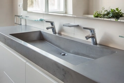 Faucet on the countertop in the bathroom photo