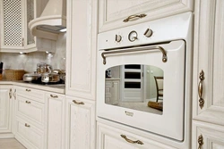 Oven in a bright kitchen photo
