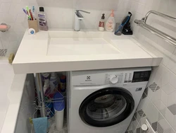 Washing machine draining into bathtub photo