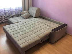 Sofa bed with sleeping place photo