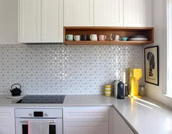 Wallpaper instead of tiles in the kitchen photo