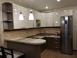 Photo of a kitchen with a set in the middle