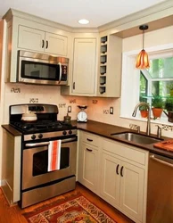 Photo Of A Kitchen With A Set In The Middle