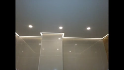 Photo of a floating stretch ceiling in the bathroom