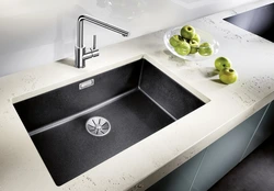 Photo of white kitchen sinks