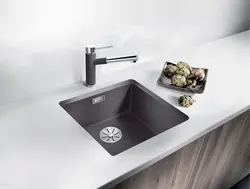 Photo of white kitchen sinks