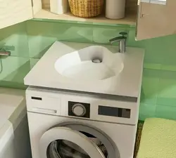 Washing Machine With Sink In The Kitchen Photo